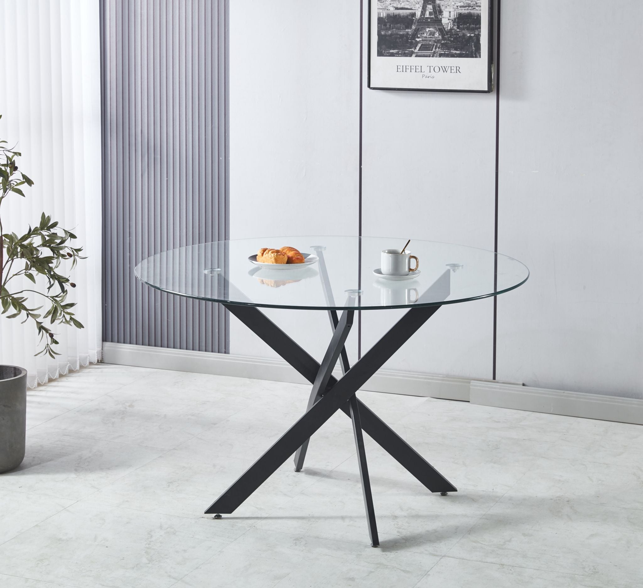 Tavolo con top in vetro tondo da 120 cm