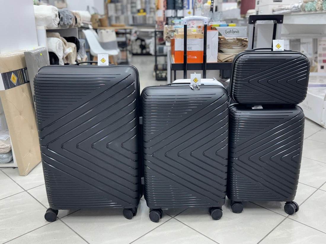 Set di 4 valigie in ABS rigido nero