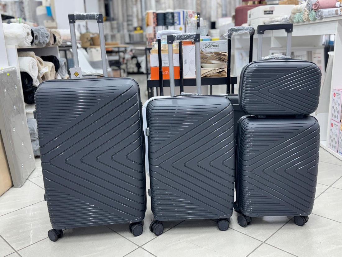 Set di 4 valigie in ABS rigido grigio