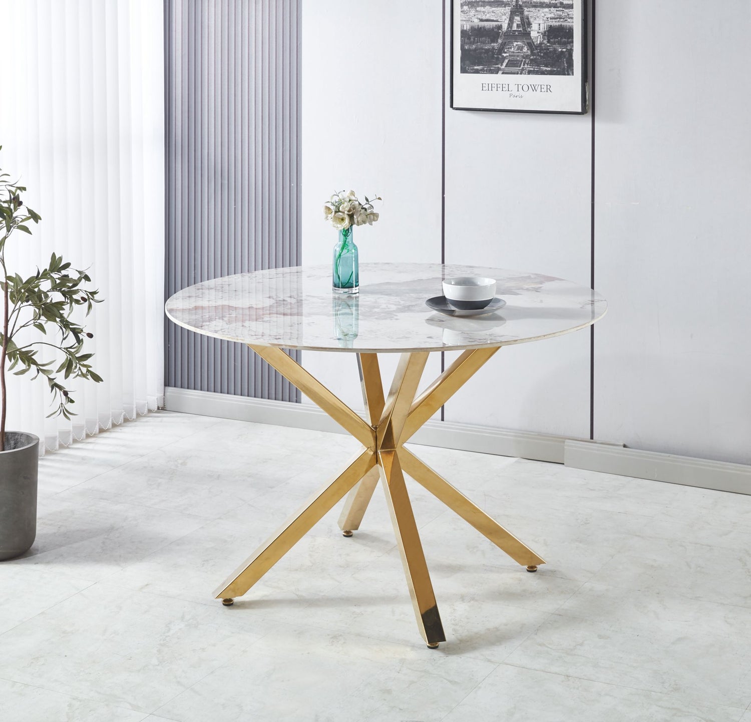 Tavolo con top in marmo tondo da 120 cm