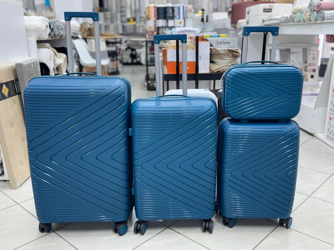 Set di 4 valigie in ABS rigido blu