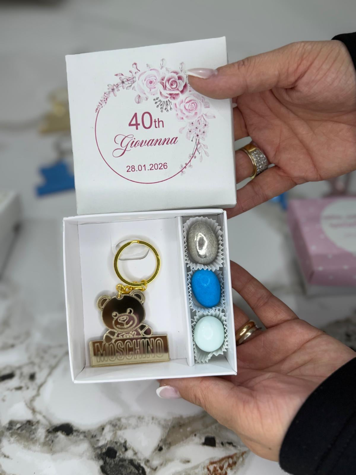Confezione bomboniere con portachiavi