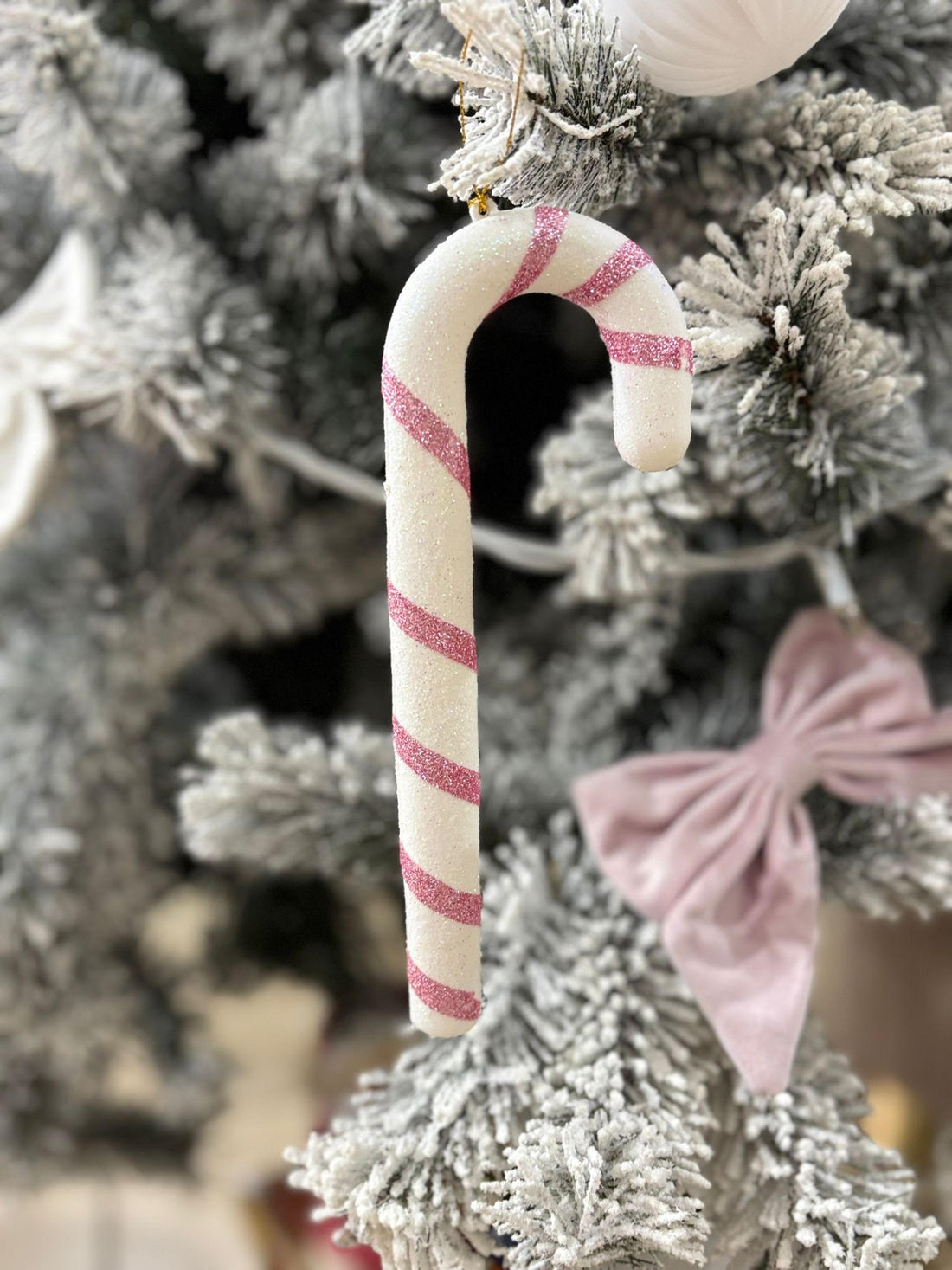 Set 2 bastoncini natale plastica rosa e bianco