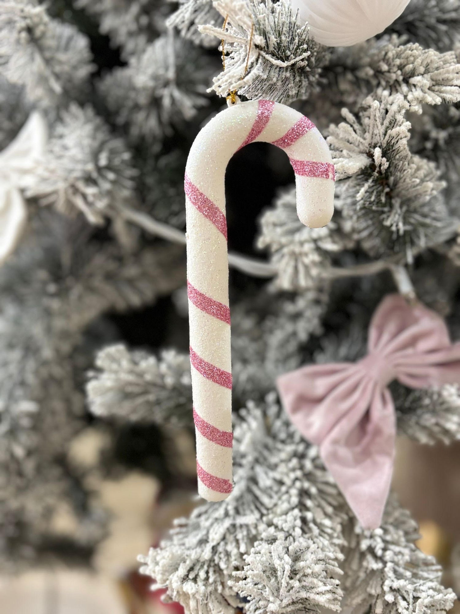 Set 2 bastoncini natale plastica rosa e bianco