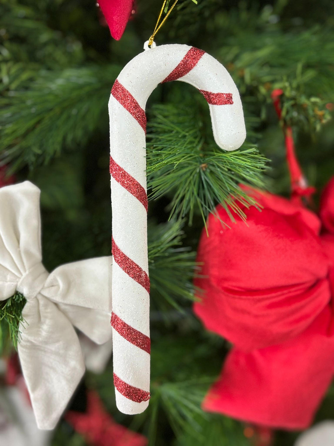 Set 2 bastoncini natale plastica rosso e bianco